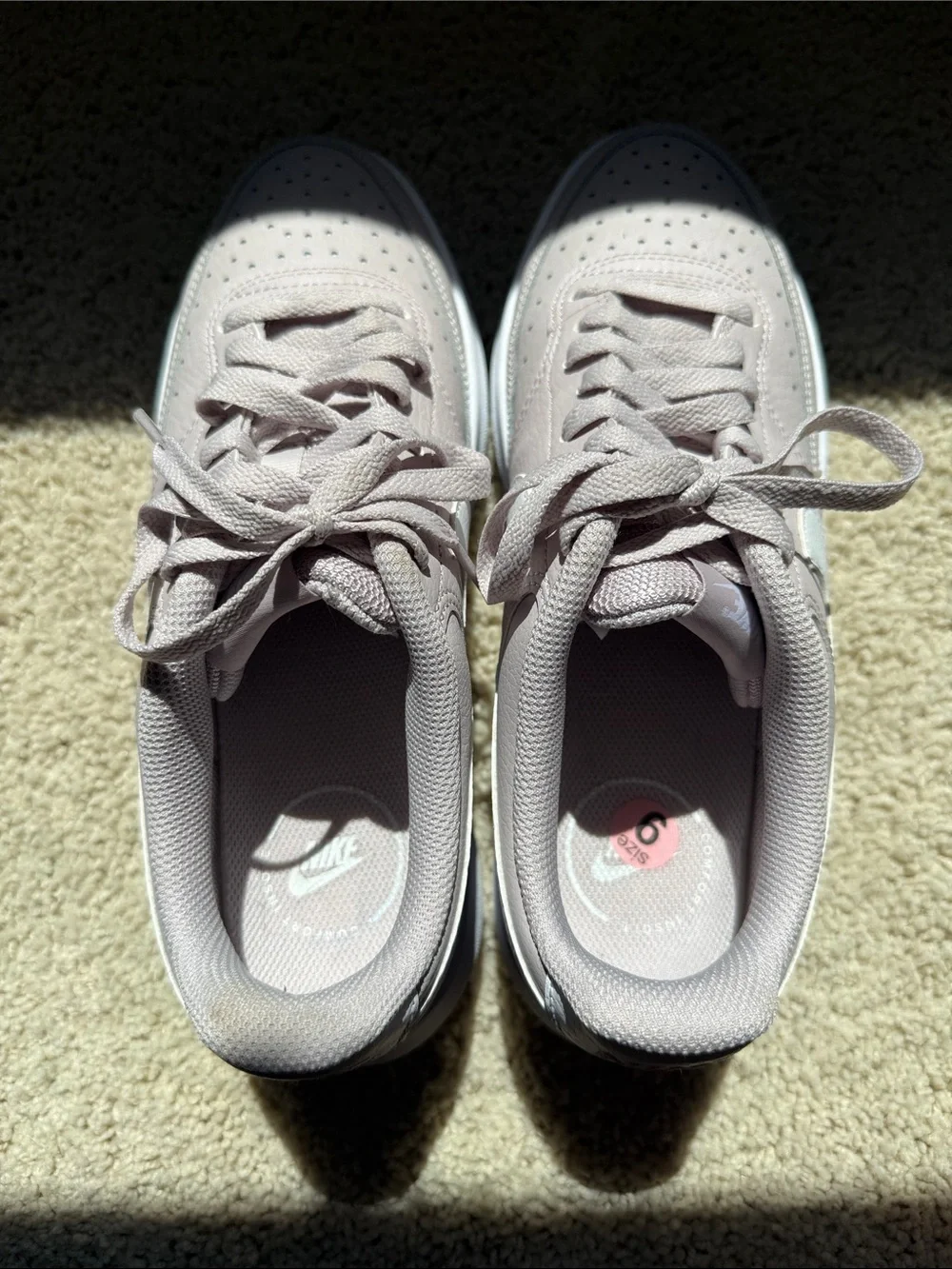 Nike Women’s Light Pink Platform Sneakers with White Swoosh